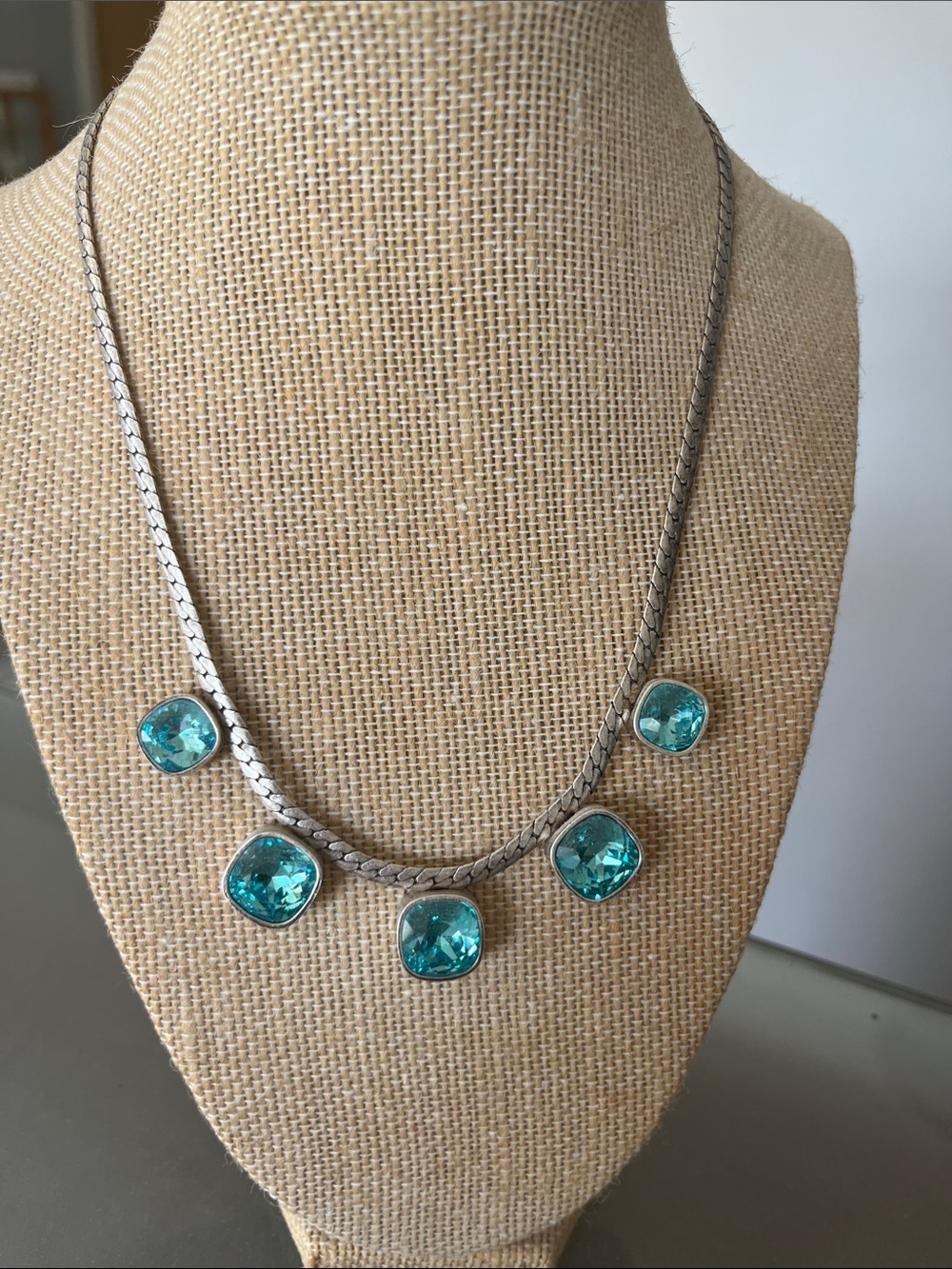 Touchstone Crystal Silver Necklace with Teal Blue Crystal Pendants